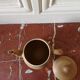 Vintage stoneware teapot and cup, "selfish" tea service, signed