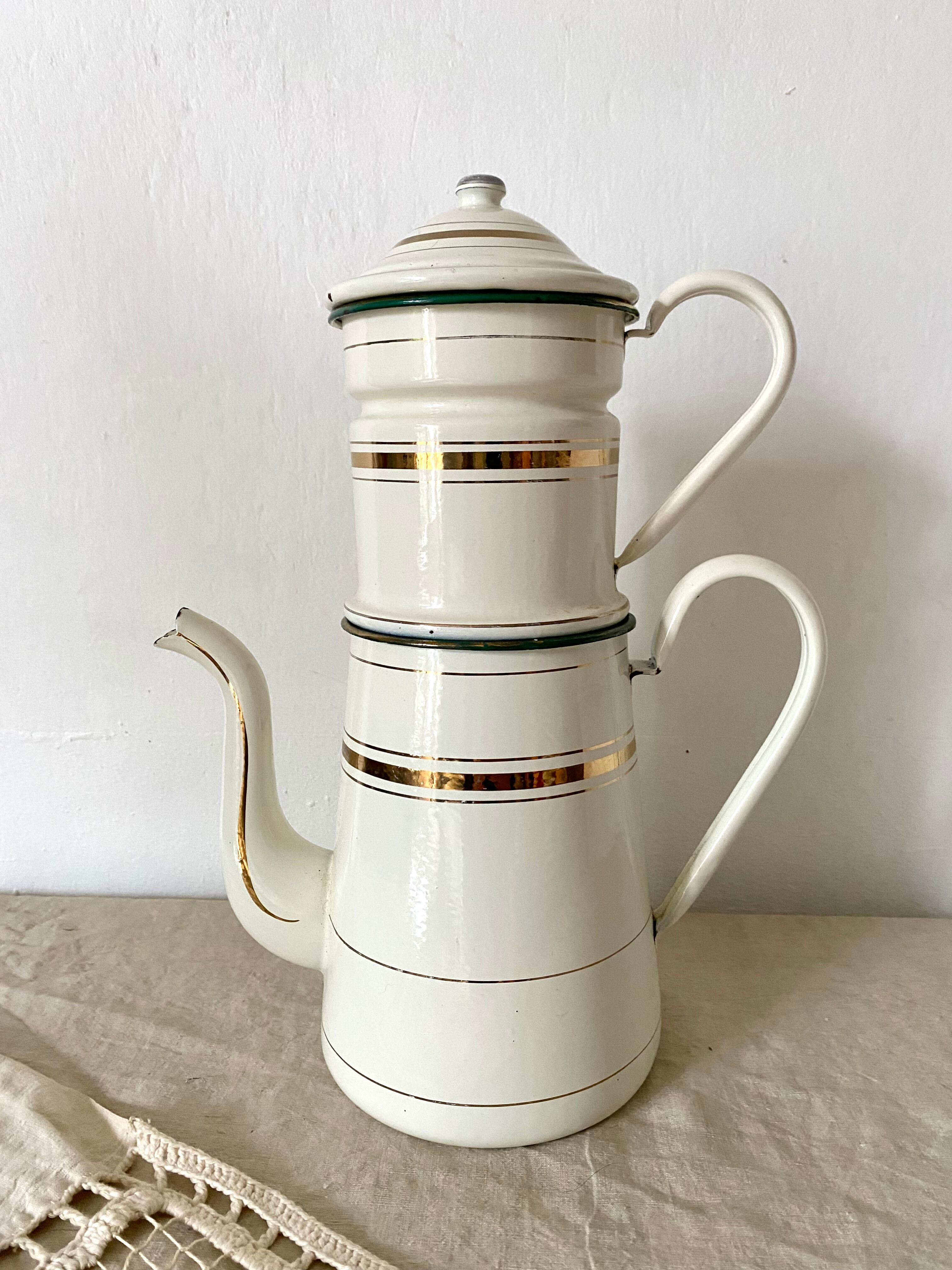 Antique coffee maker in enamelled sheet metal