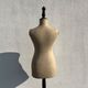 Antique mannequin in fabric and blackened wooden foot Stockman Paris Le Louvre