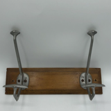 Wall coat rack with 2 hooks on wood