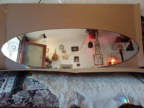 Miroir mural ovale italien 1950 .