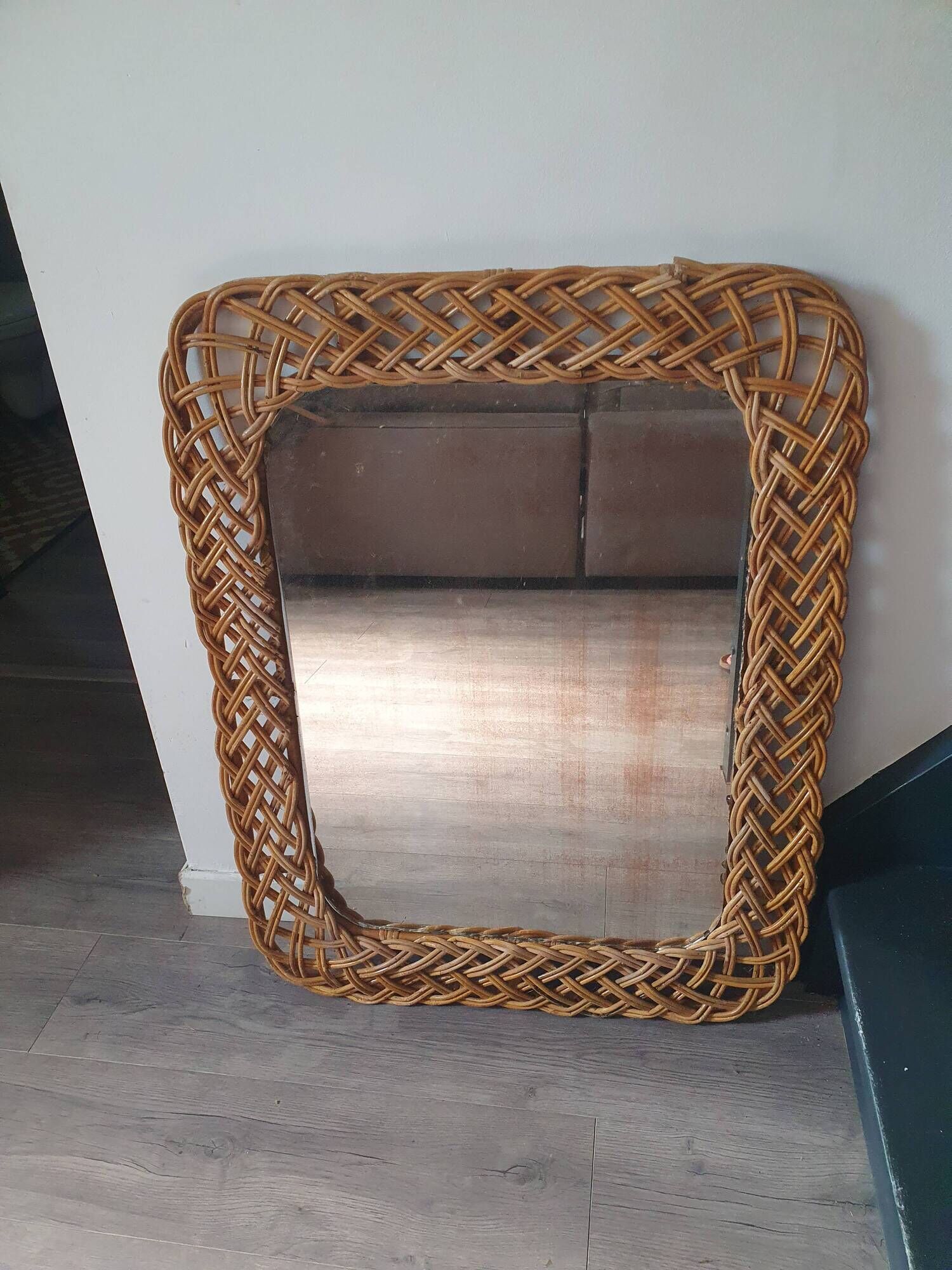 large vintage mirror in woven rattan 66 86 cm with some defects