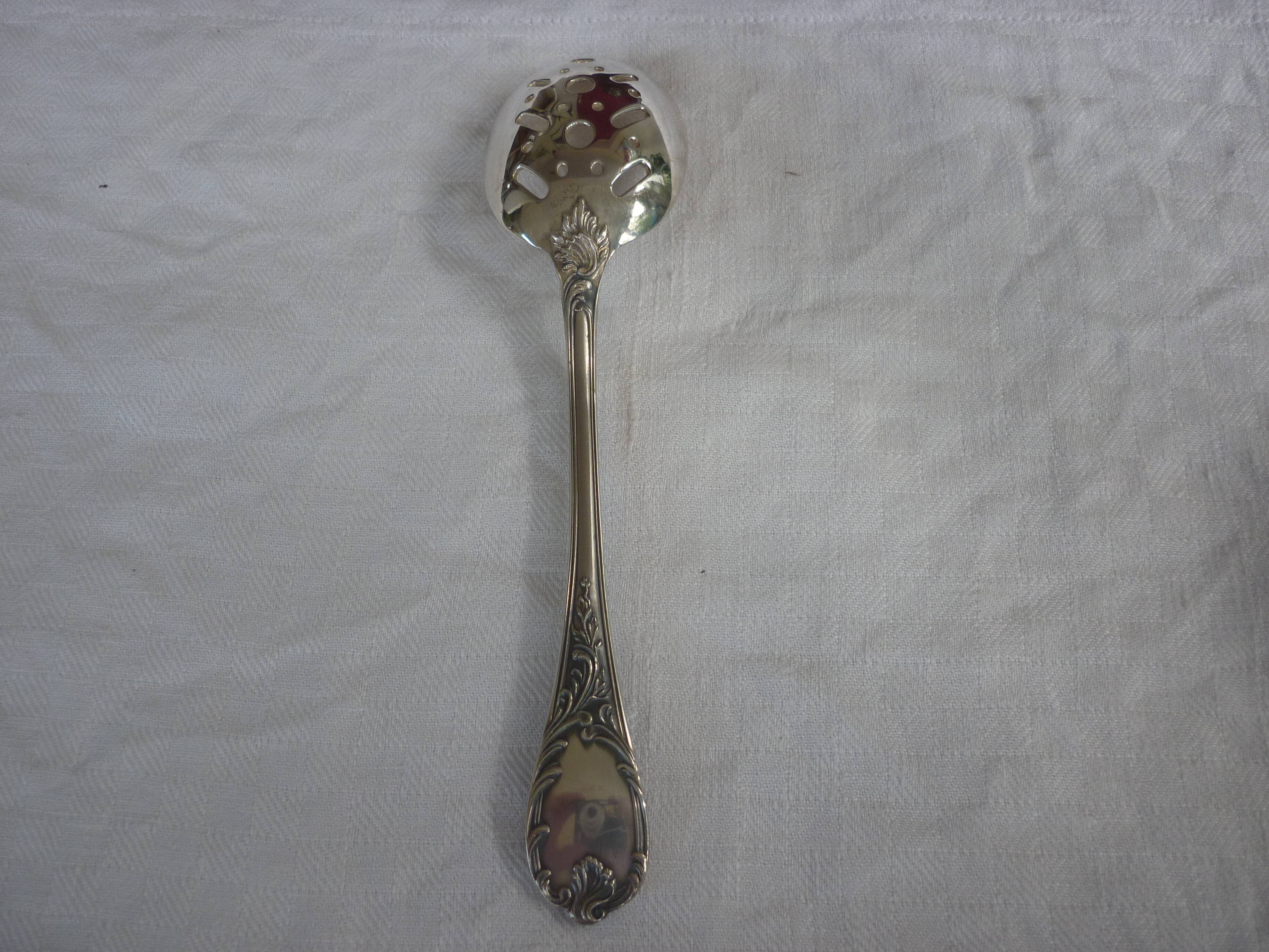 Spoonful with silver metal cubes Christofle
