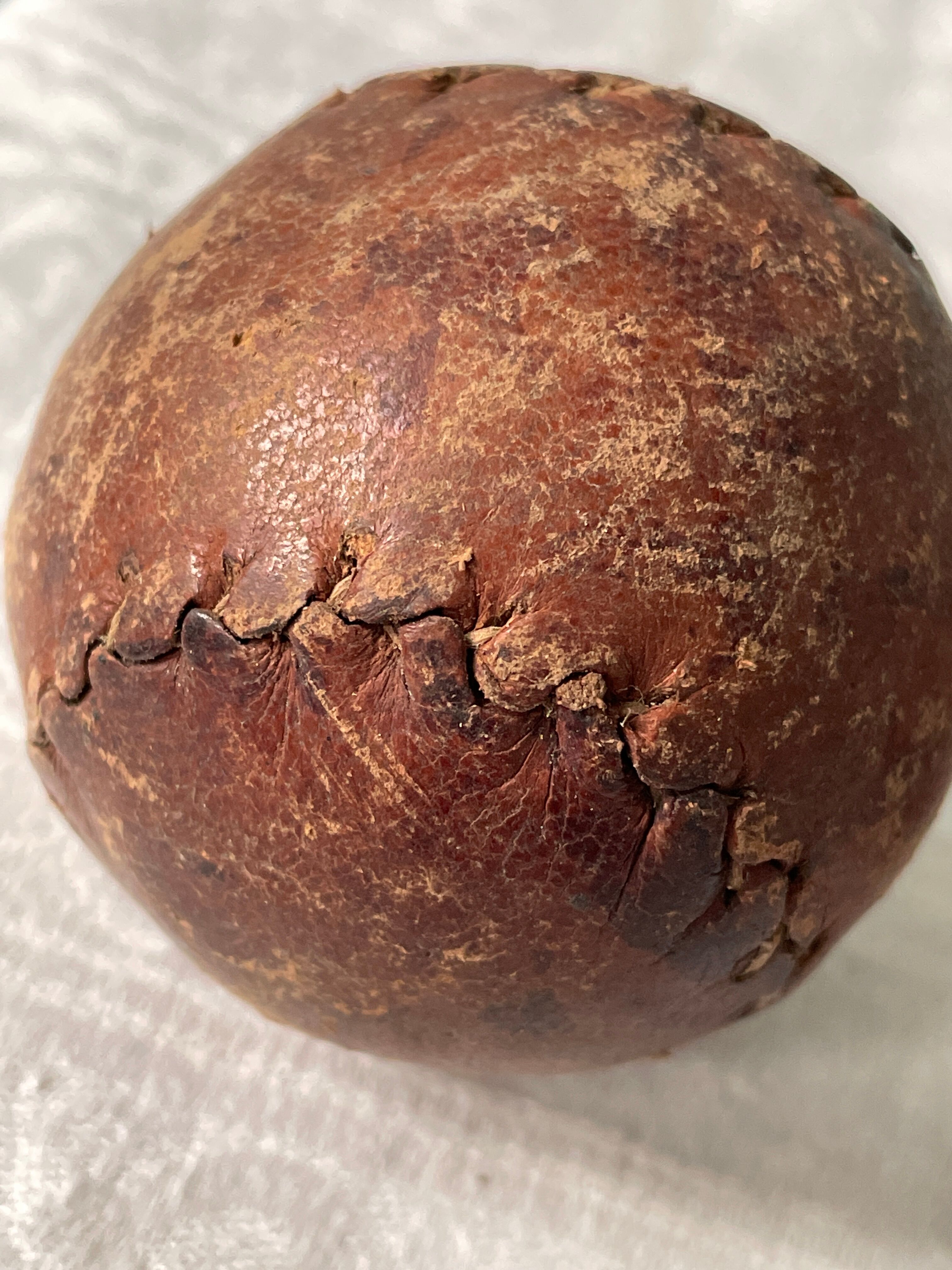 Two old nineteenth century leather golf balls