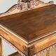 Louis XVI style music cabinet in carved wood with caning, 19th century.