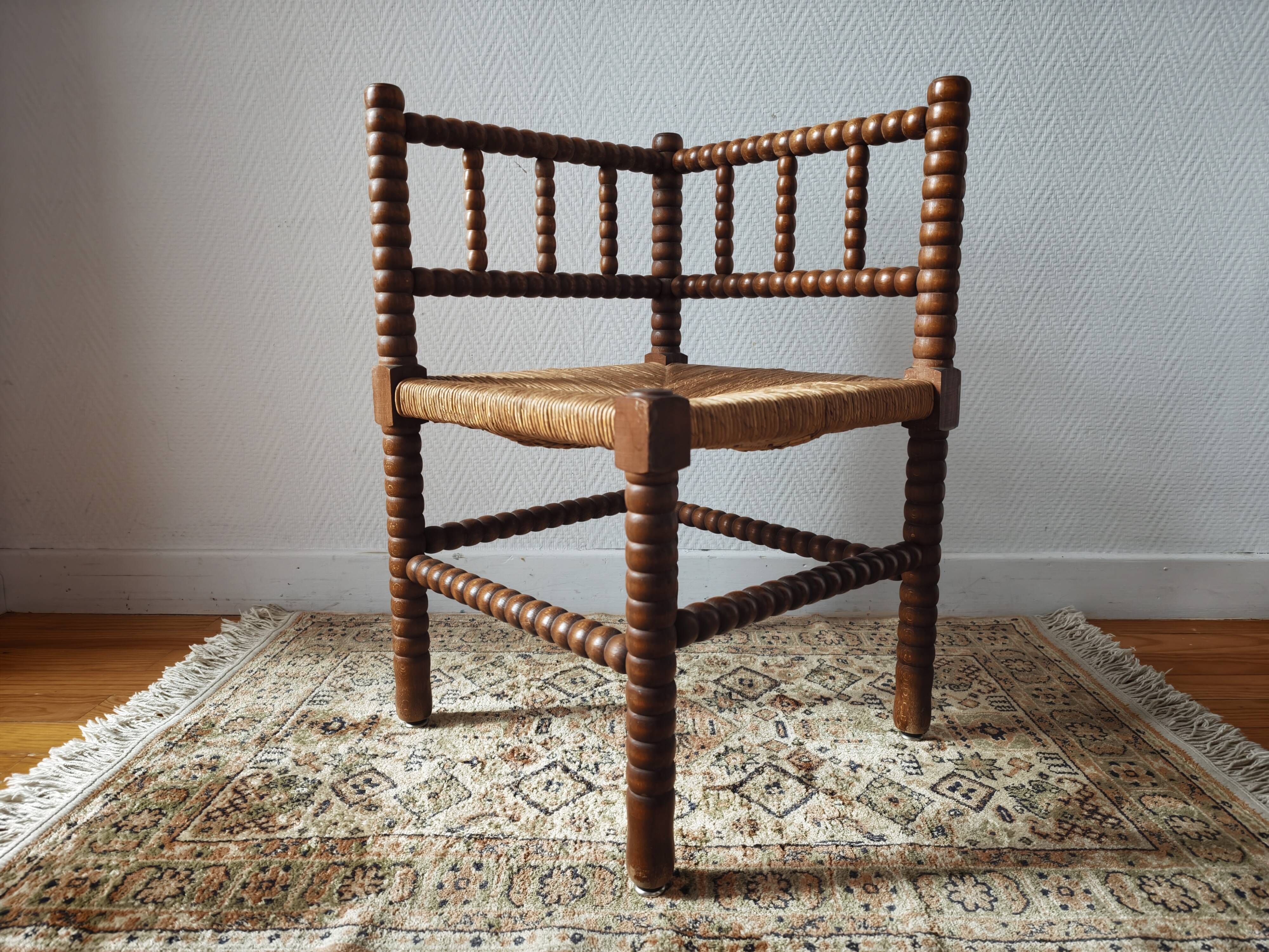 Chaise vintage coin du feu en bois tourné bobine