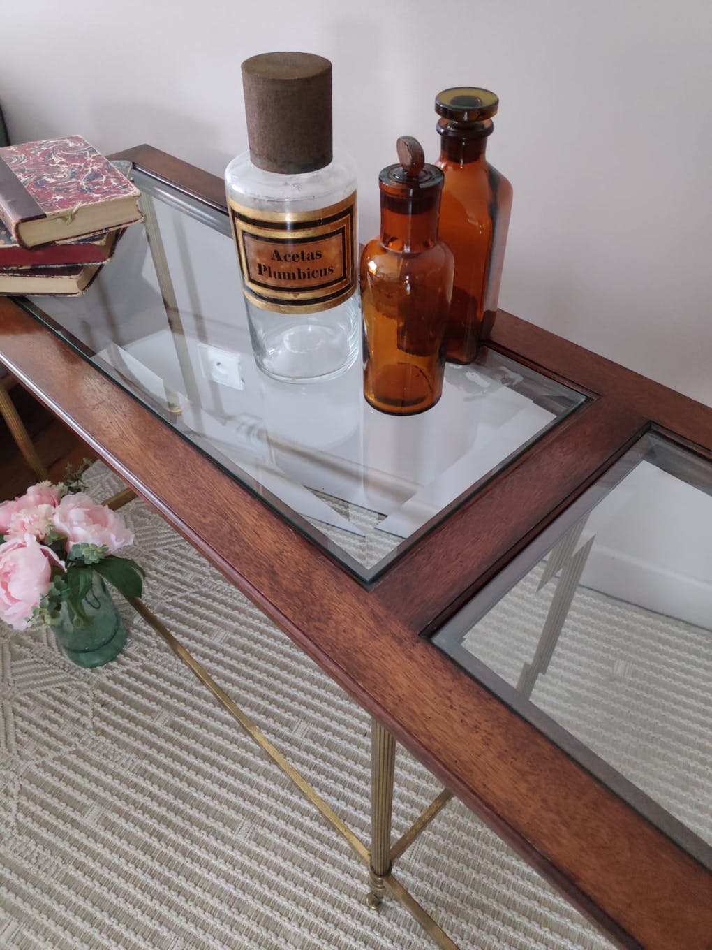 Glass and brass console table