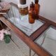 Glass and brass console table