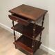 Small table in mahogany, leather and brass