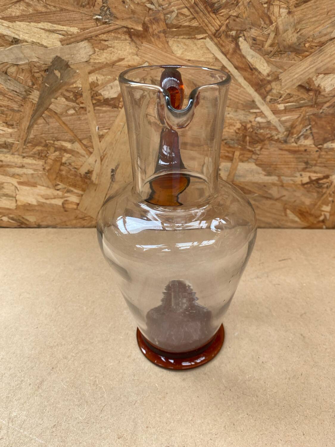 Antique clear blown glass pitcher + orange handle & foot vintage