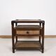 Rattan and cane bedside table, smoked glass top