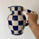 Antique blue and white checkered pitcher