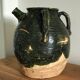 Green glazed ceramic pot