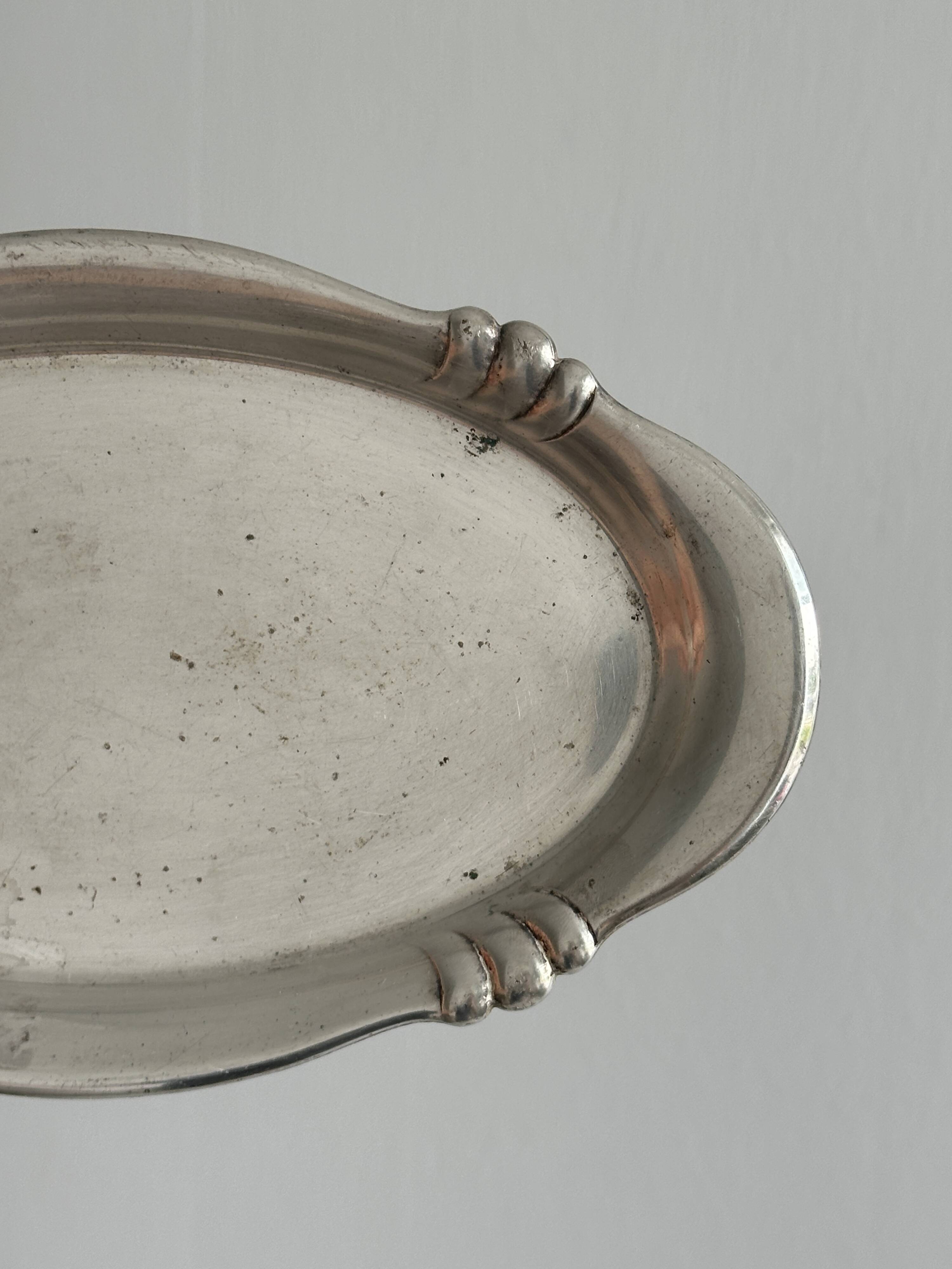 Small vintage tray in silver-plated light metal