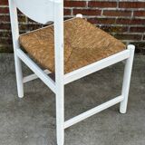 Vintage chair with wicker seat, minimalist design