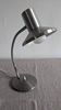 Articulated bedside lamp or wall light in aluminium, France circa 1960.