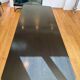 Large dining table in BS Style made of black oak and iron.
