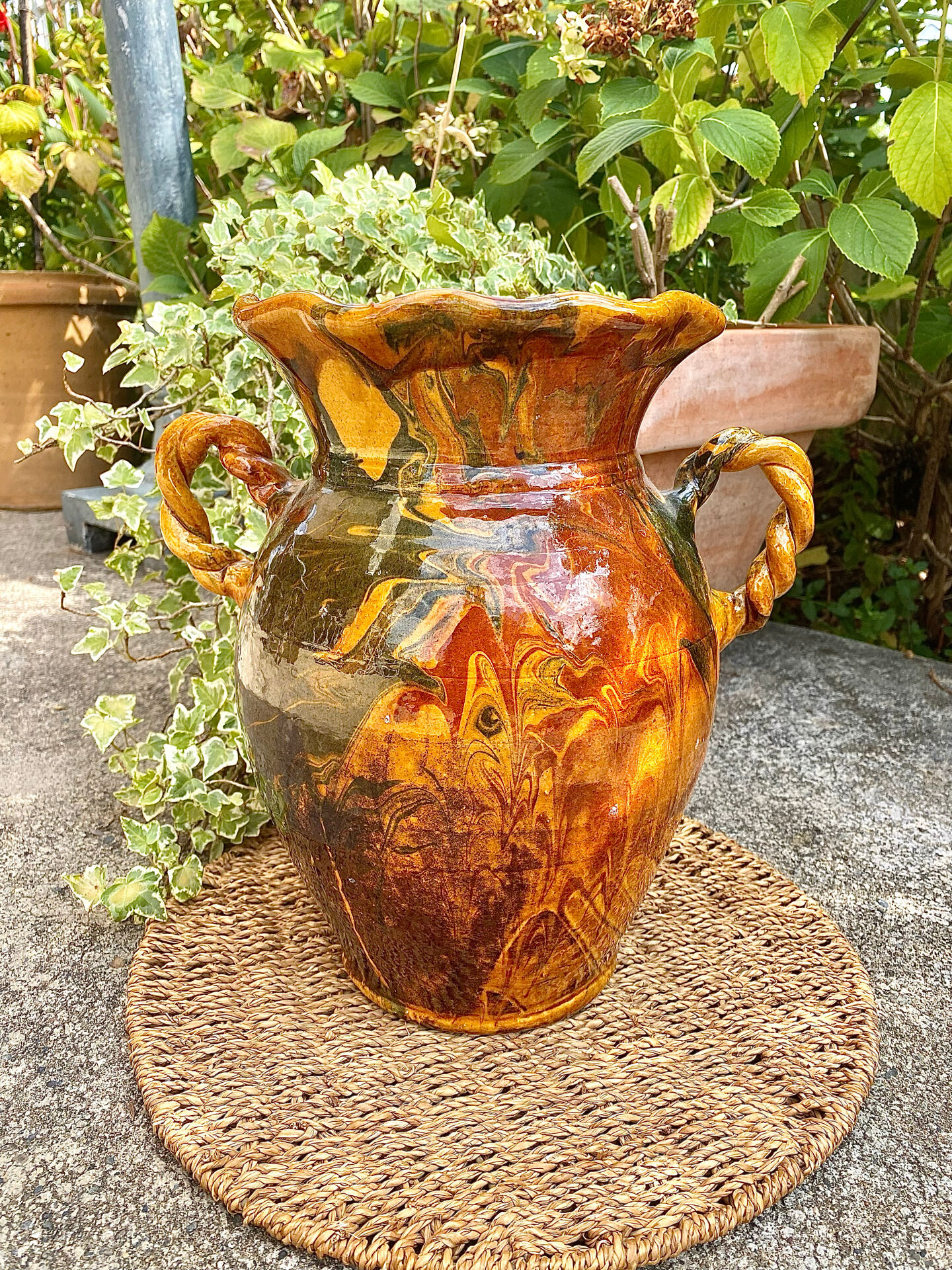 Ancient large vase in glazed speckled terracotta