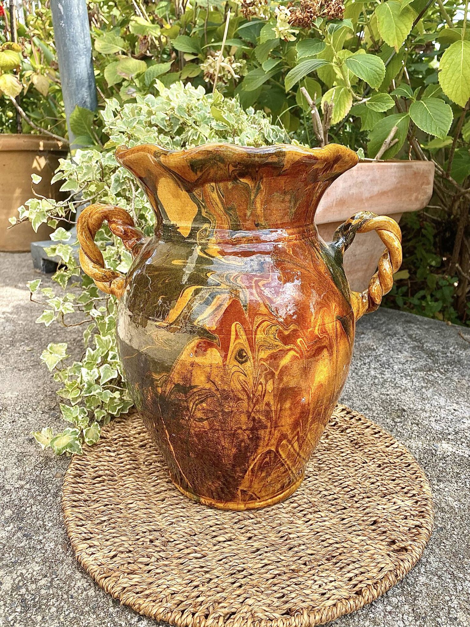 Ancient large vase in glazed speckled terracotta