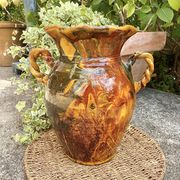 Ancient large vase in glazed speckled terracotta