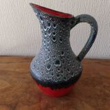 red and gray pitcher