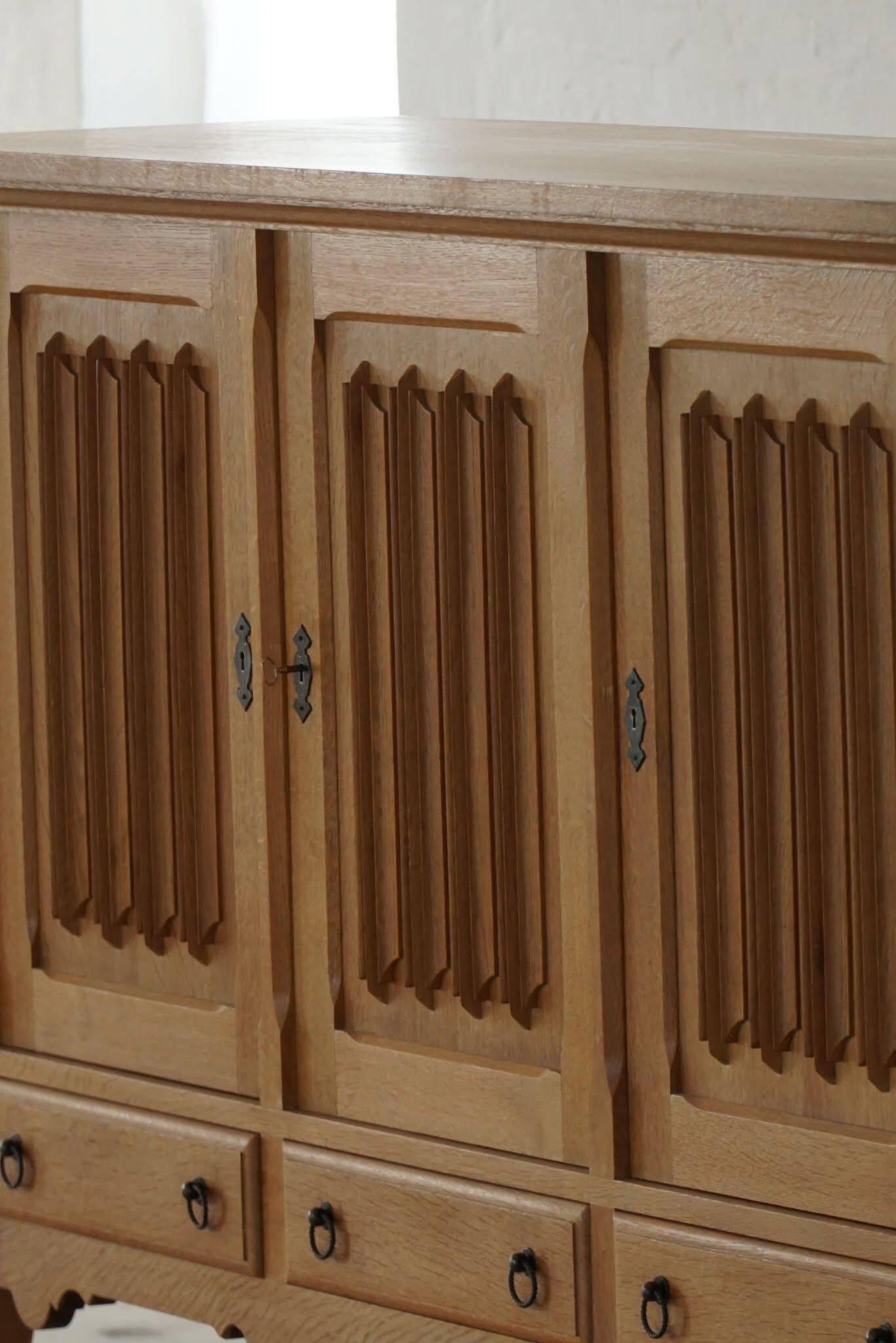 Brutalist oak sideboard, mid-century Danish design, Kjærnulf style, 1960s.