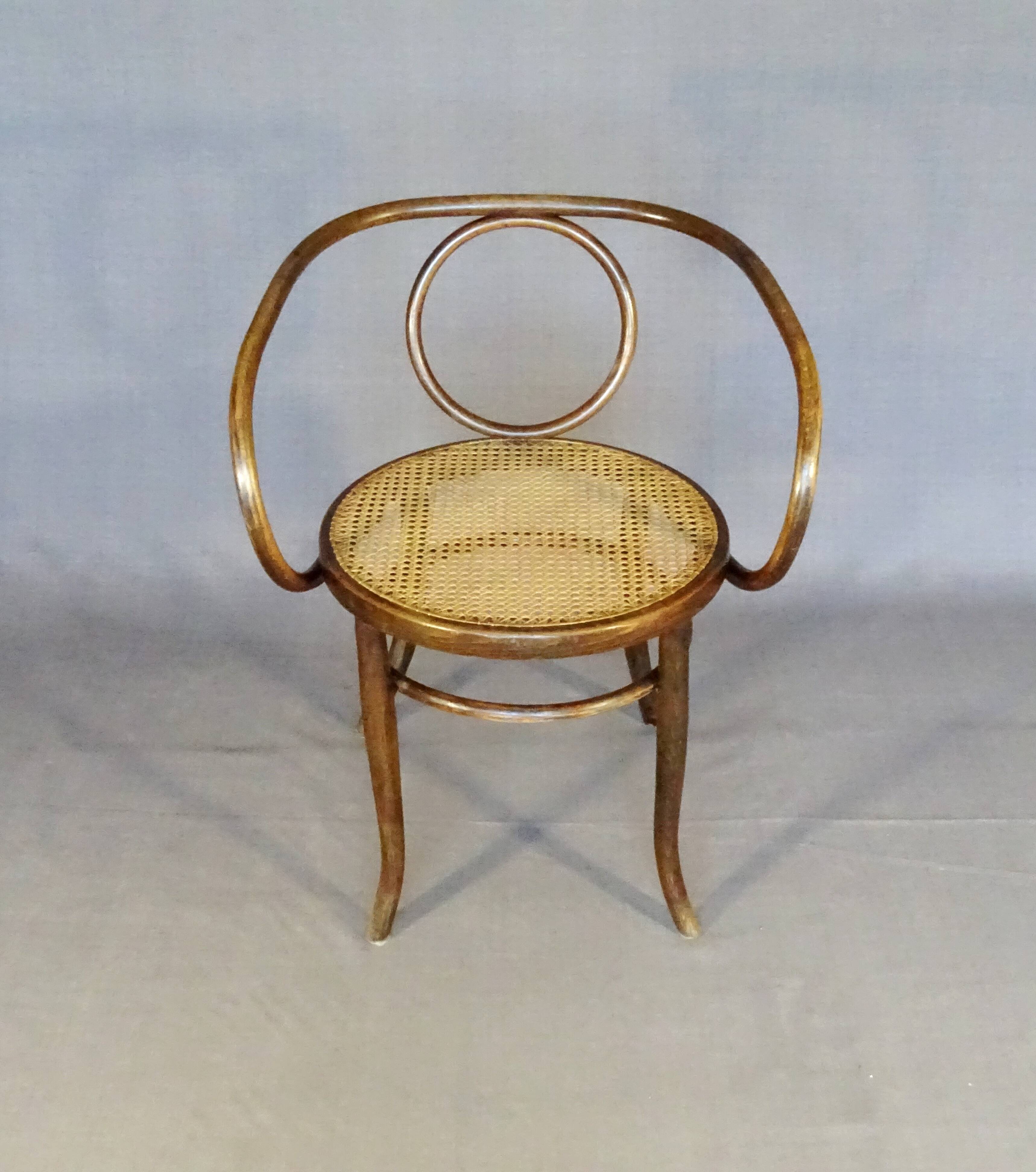 Le Corbusier armchair by Fischel 1890 caned, not Thonet.