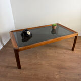 Large Scandinavian coffee table in teak and smoked glass.