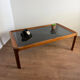 Large Scandinavian coffee table in teak and smoked glass.
