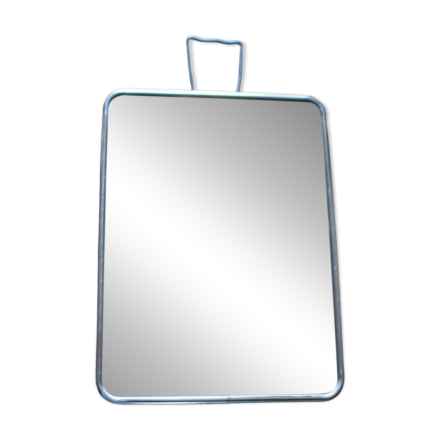 Simple rectangular barber mirror with a stand.