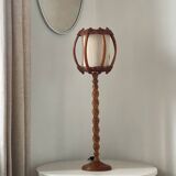 Turned wood lamp.