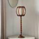 Turned wood lamp.