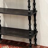 Blackened wooden shelf.
