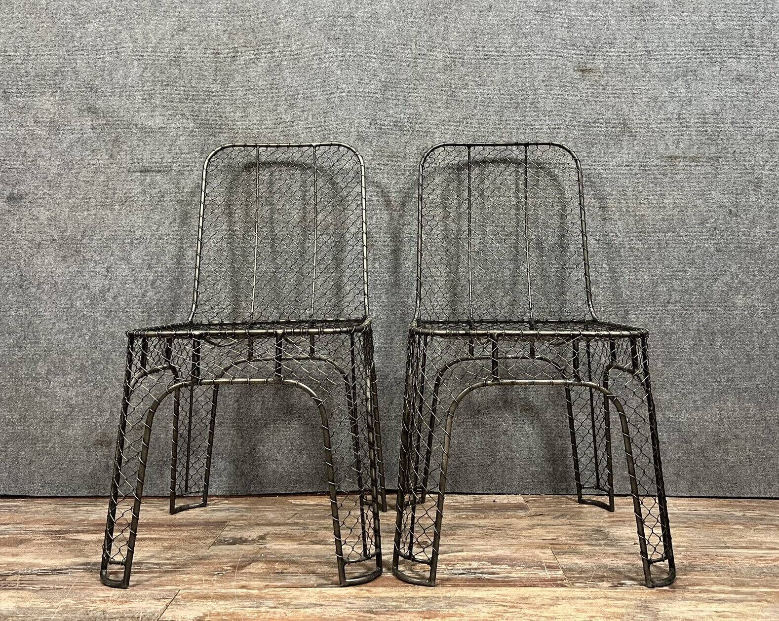 Pair of industrial design chairs in woven iron circa 1980