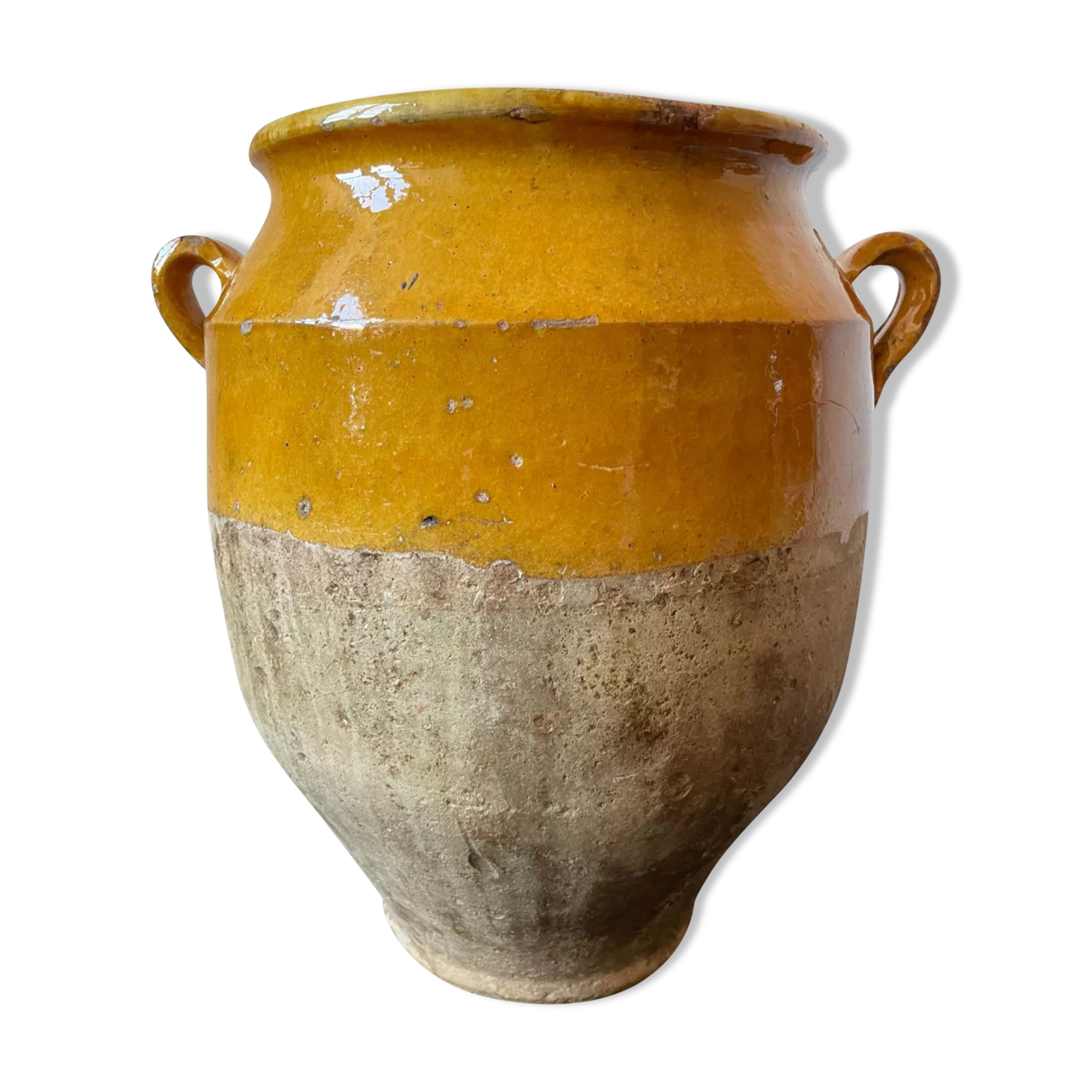 Old yellow glazed terracotta grease pot south west France