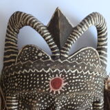 African mask with raffia and kaolin dots