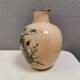 Italian vase from the 70s, in a delicate pink color with floral decoration.