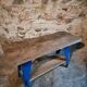 Vintage industrial workbench table with cast iron legs (Aux Forges de Vulcain)