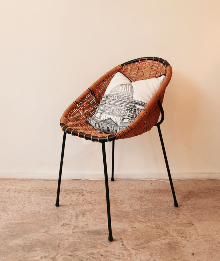Wicker and metal armchair