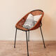 Wicker and metal armchair