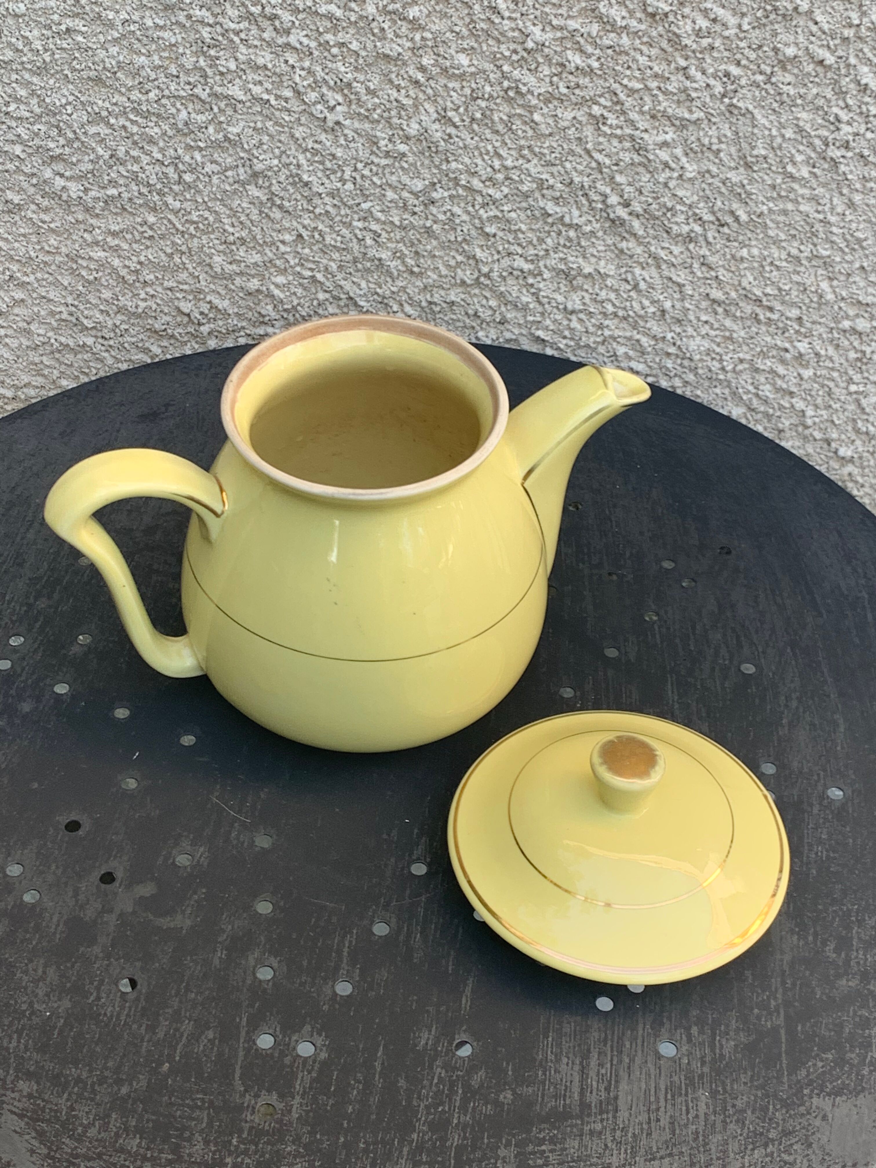 Teapot, yellow earthenware coffee maker and vintage gold edging
