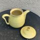 Teapot, yellow earthenware coffee maker and vintage gold edging