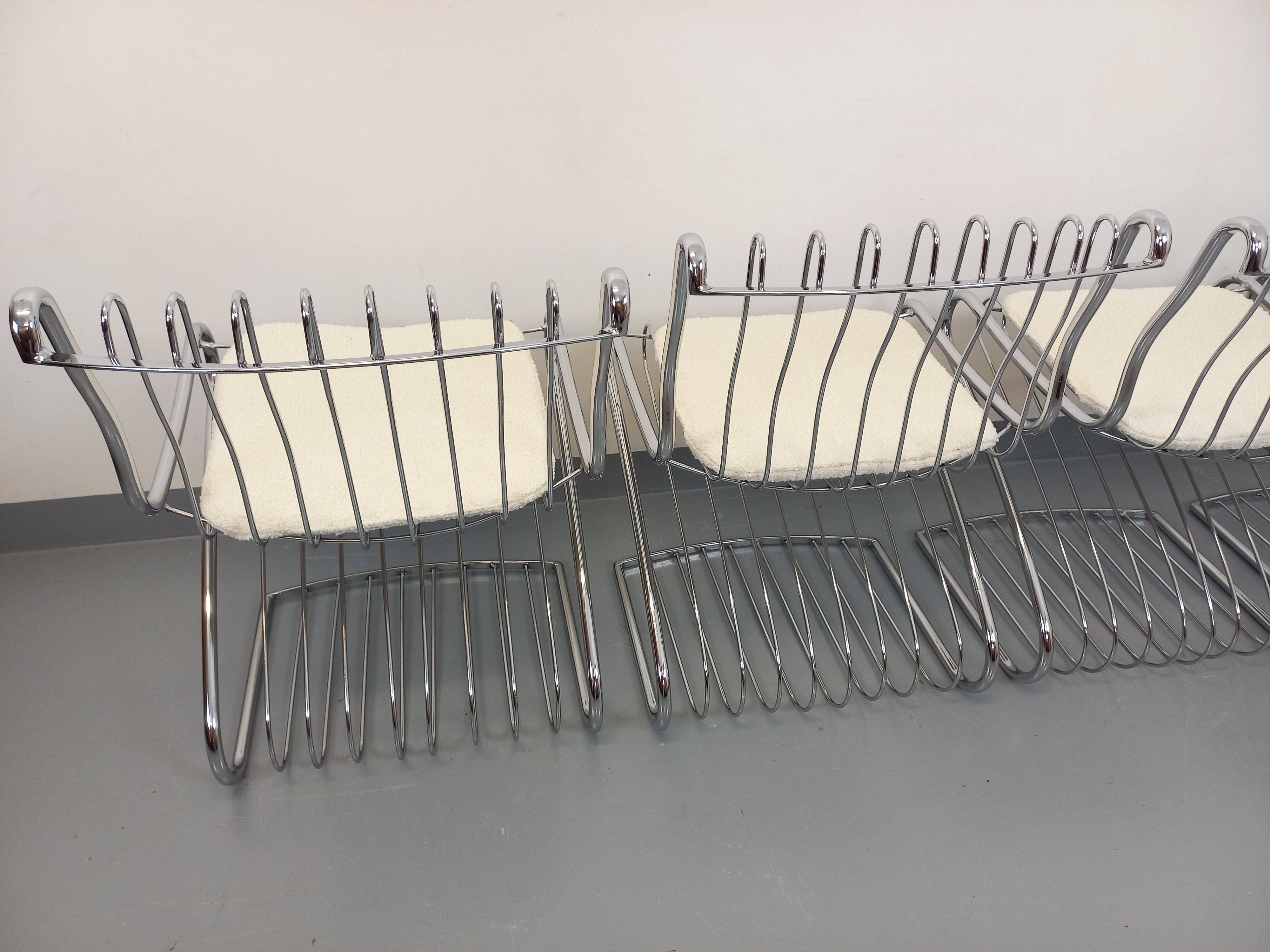 Set of 4 vintage Italian chairs by Gastone Rinaldi in chrome metal.