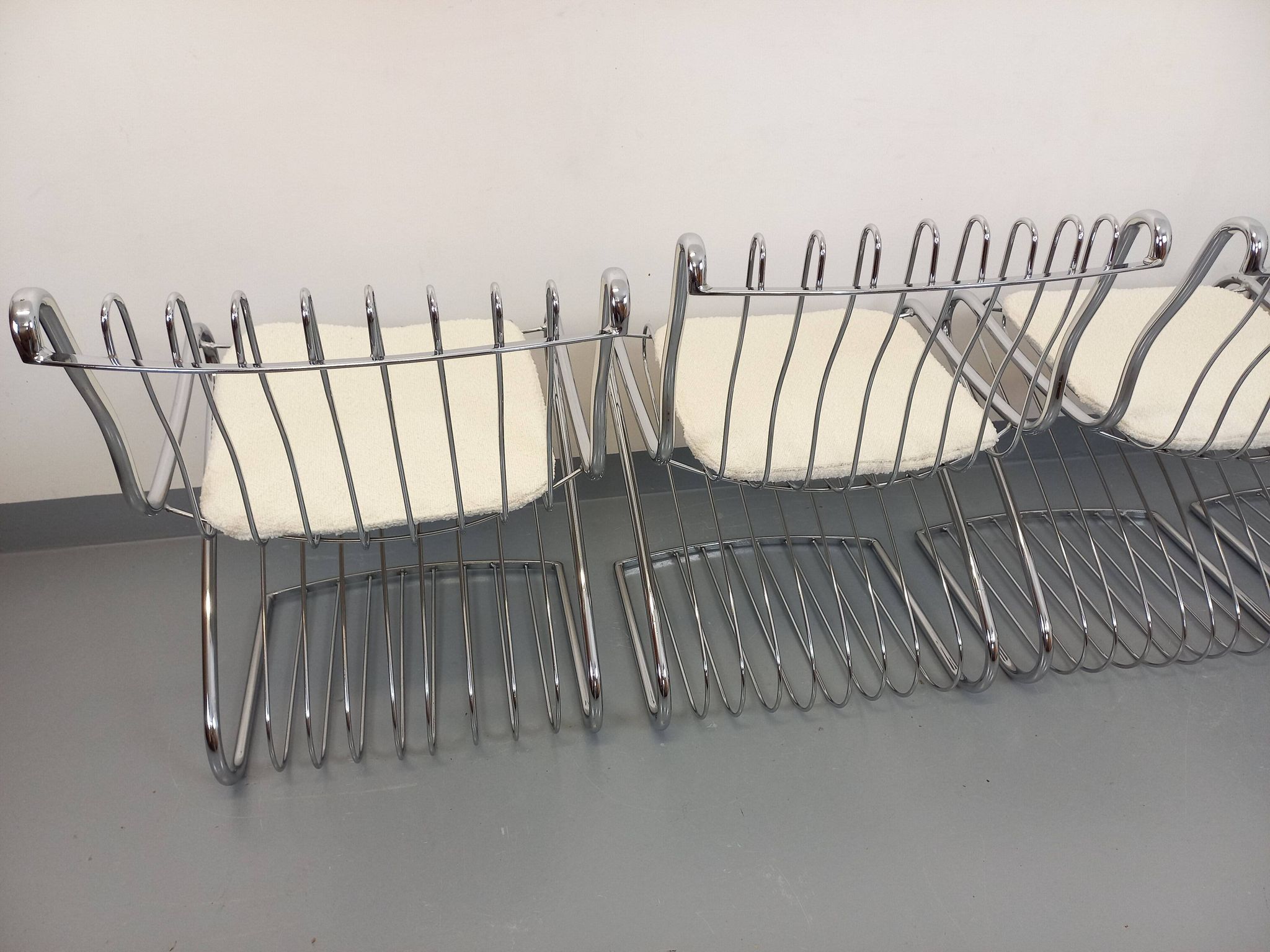 Set of 4 vintage Italian chairs by Gastone Rinaldi in chrome metal.