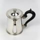 Christofle teapot in silver-plated metal, with a blackened wood handle — late 19th century, early 20th century.