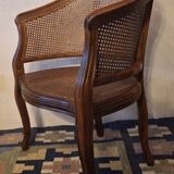 Half-moon rattan and hardwood armchair, early 20th century