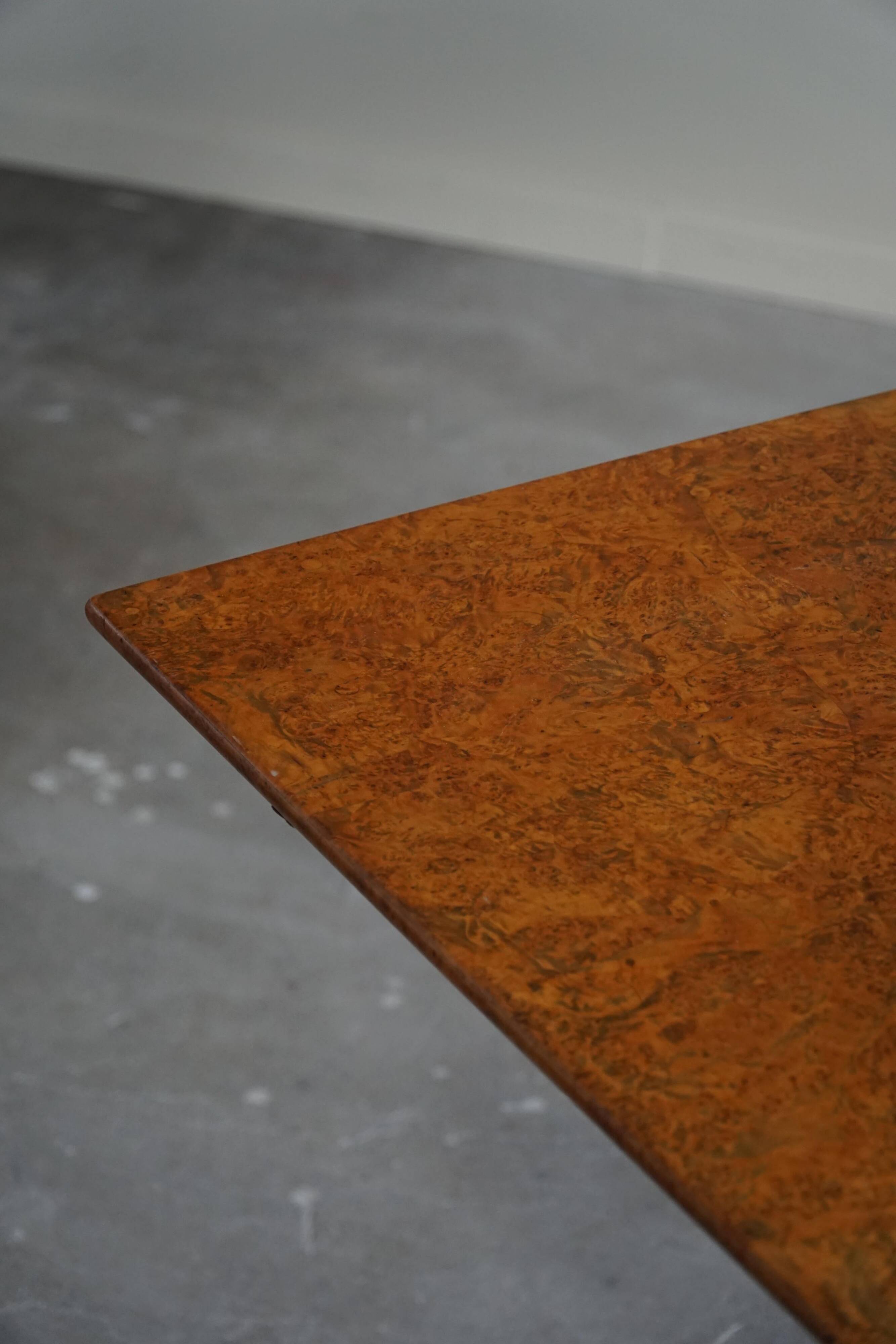 A Swedish folding table made of burl wood by Carl Hollst, Eskilstuna, 1787-1830.