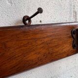 Vintage industrial wooden coat rack with porcelain hooks