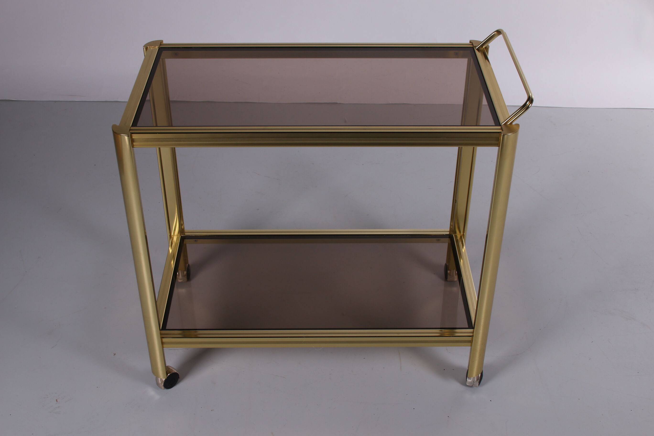 Hollywood Regency trolley with smoked glass