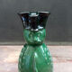 Terracotta jug in the shape of a soldier with a moustache